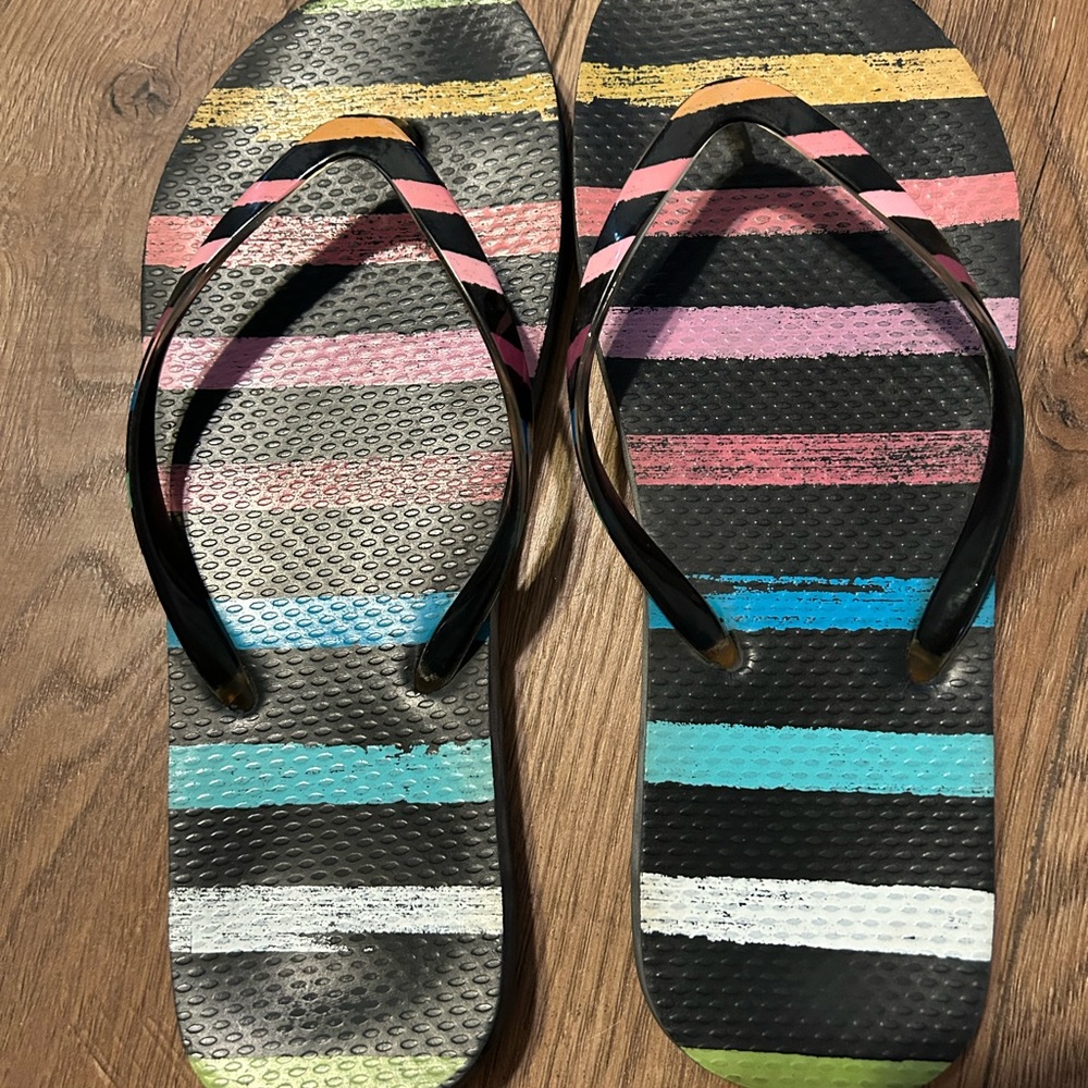 Multi colored flip flops